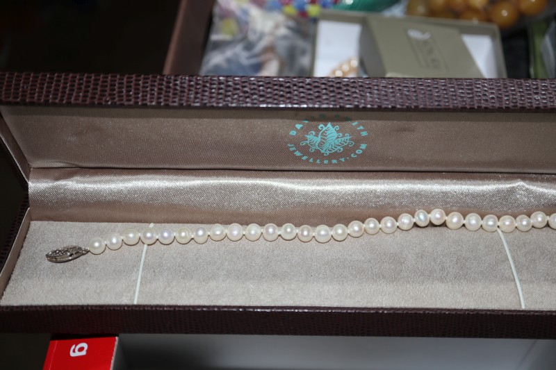 Assorted jewellery including cultured pearl necklace, costume and pair of silver earrings.